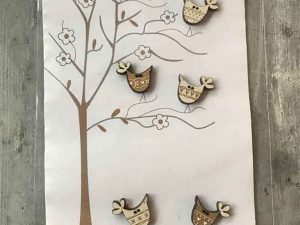 Cream and Tan bird shaped buttons by the Bee Company